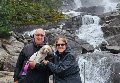 Roger, Le and Jolie in front of a waterfall